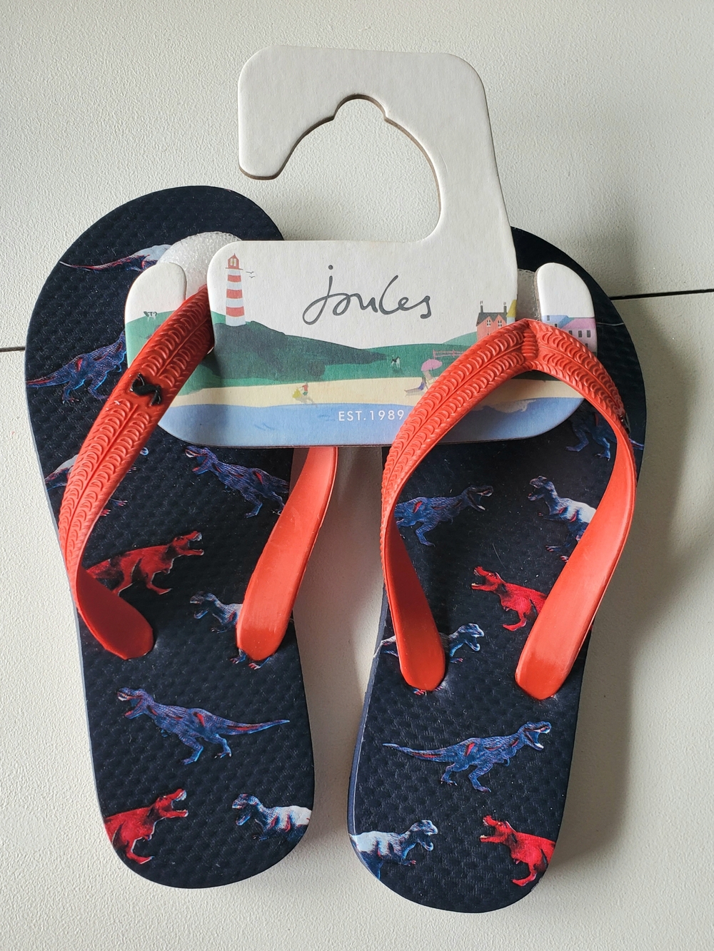 Joules Navy Dinosaur Print Flip Flops with Coral Straps